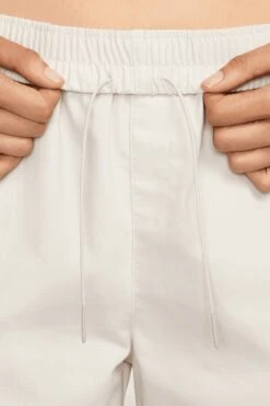 W NSW EVERYTHING WOVEN CARGO PANTS(Nike Womens Nsw Everything Wovens Fv7643_lt Orewood Brn Black) -Sporty Fashion 1nikeapparel 0028 AURORA FV7643 104 PHSYM001 2000