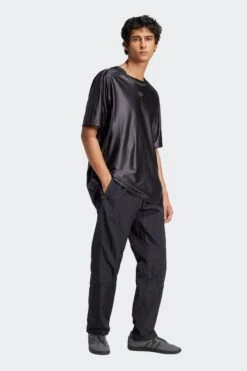 2000 TRACK PANTS(Adidas Mens 2000 Track Pants_black) -Sporty Fashion adidas 0013 JC6225 4 APPAREL OnModel WalkingView transparent